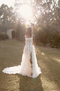 bride wearing new bridal gown from Anna Campbell bridal collection Bloom 2024