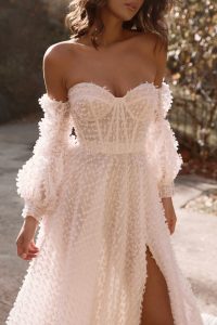 bride wearing new bridal gown from Anna Campbell bridal collection Bloom 2024