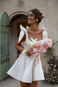 bride wearing new reception mini bridal gown from Anna Campbell bridal collection Bloom 2024
