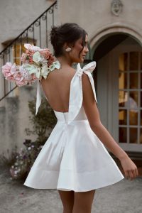 bride wearing new reception mini bridal gown from Anna Campbell bridal collection Bloom 2024