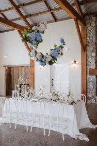 Blue and white hanging floral installation by Maleny wedding florist