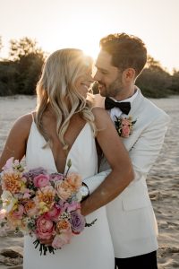 Bride and groom on Noosa main beach
