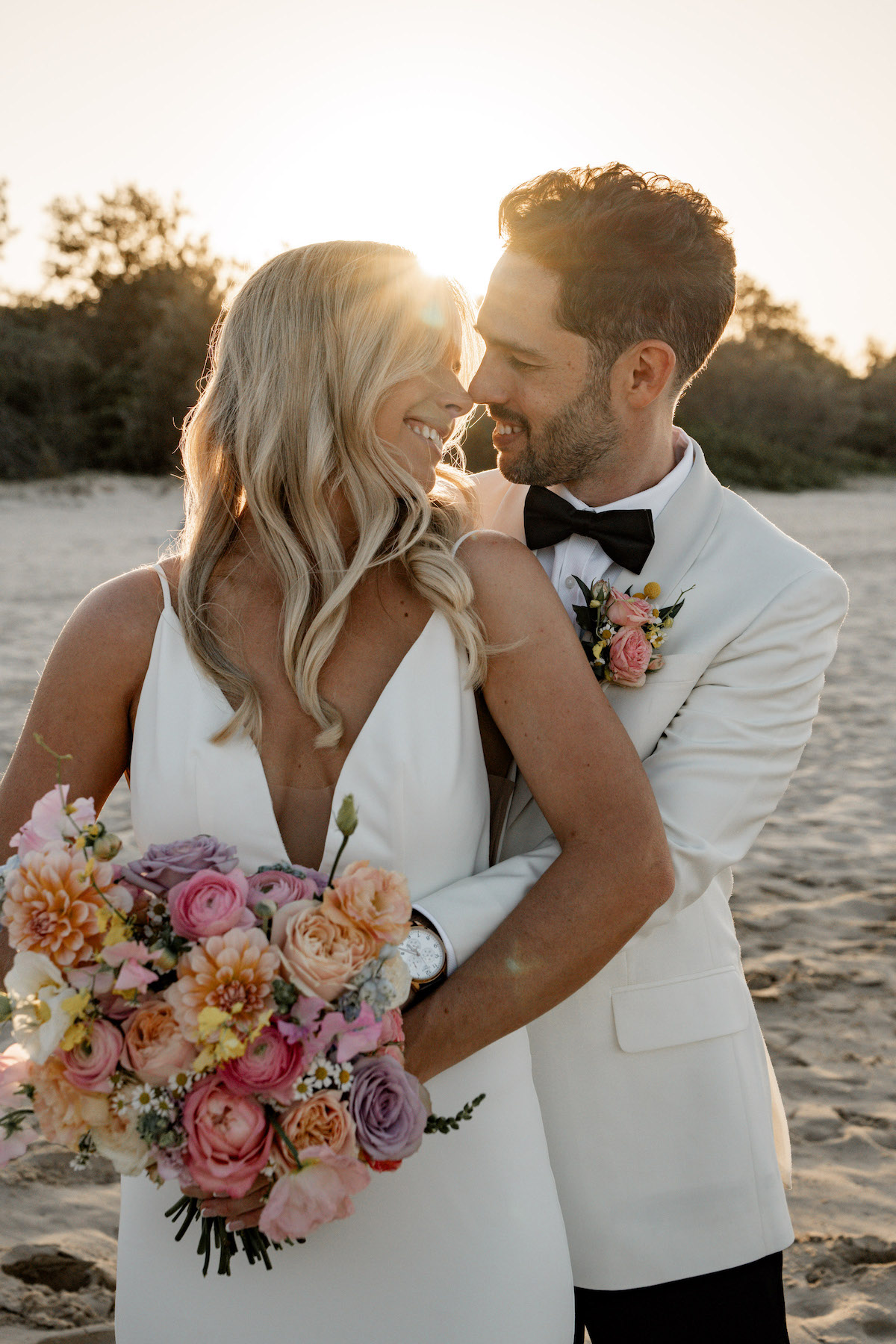 Bride and groom on Noosa main beach