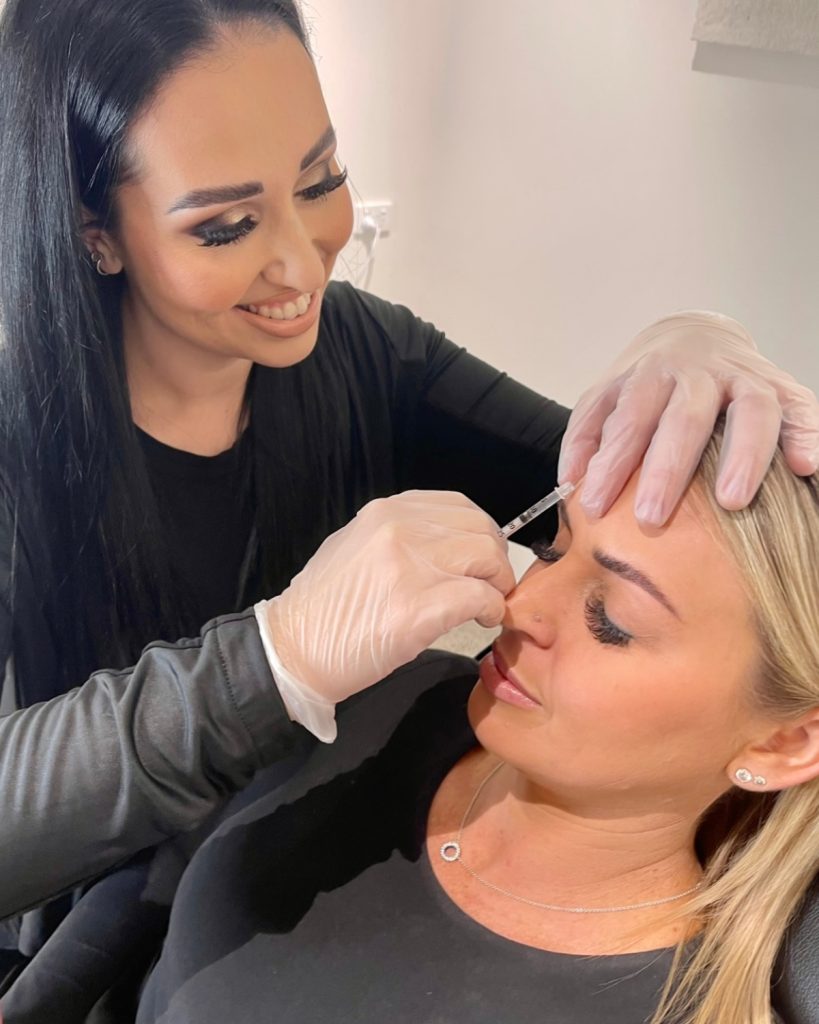 Woman receiving anti-wrinkle injections from Sunshine Coast cosmetic injectables nurse
