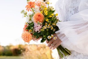 bridal bouquet with peach dahlias and yellow daisies by Sunshine Coast florist