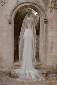 bride wearing new bridal gown from Anna Campbell bridal collection Bloom 2024
