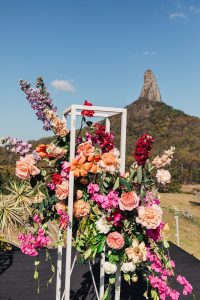 outdoor wedding ceremony under the glass house mountains