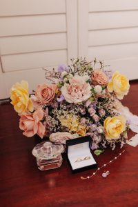 bride's bouquet layout with jewellery