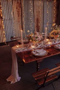 reception tablescape in twilight with draping fabrics and candles lavender theme wedding sunshine coast country wedding venue