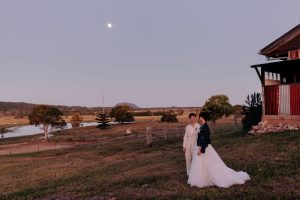 twilight bride and groom photo shoot on luxury country estate wedding venue Yandina Station